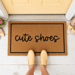 a door mat that says cute shoes on it