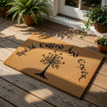 A rectangular door mat with the text "Speik Eiend And Encoder" printed on it, along with a tree design.