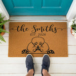 a door mat with a picture of a poodle on it