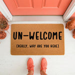 Funny Un-Welcome doormat with rude text on a natural coir fiber welcome mat, featuring a sarcastic front porch entry rug design that makes a humorous housewarming gift for a home with a funny sense of humor and personality.