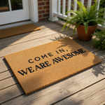 Funny Come In We Are Awesome coir doormat with bold black text on a natural fiber rug, this durable outdoor welcome mat is a humorous front porch decor piece for your home entrance, entryway, or housewarming gift for new