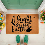 Easter welcome doormat with A Bright and Happy Easter text and a cute bunny silhouette, this natural coir fiber outdoor floor mat features spring floral decor and is a festive seasonal front porch rug for your home entryway.