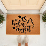 O Holy Night Christmas doormat featuring a festive tree and snowflake design on natural coir fiber, this holiday welcome mat adds seasonal cheer to your front porch decor for a cozy winter entryway look that guests will love.
