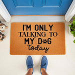 Funny dog lover doormat with the text I am only talking to my dog today, featuring a paw print design on a natural coir welcome mat for front porch decor, perfect for pet owners who love humorous home entry rugs and dog themed