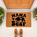 Mama Bear doormat for front porch, featuring a natural coir fiber welcome mat with black text and a bear silhouette with a heart cutout, perfect for a farmhouse entryway decor style and a cozy home entrance for any mother.