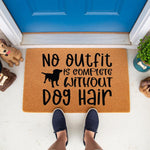 Funny dog hair doormat for pet lovers, featuring a cute dog silhouette and the text No outfit is complete without dog hair, this natural coir welcome mat is a durable front porch rug for dog owners and a humorous home decor piece.