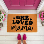 One Loved Mama doormat for front porch decor, featuring bold black text on a natural coir welcome mat.