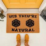 Tabletop gaming doormat featuring two twenty-sided dice and the text Yes They Are Natural, this funny welcome mat for gamers is a durable coir floor rug perfect for a front porch entrance or a home game room decor for fantasy