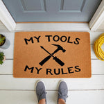 My Tools My Rules doormat featuring a hammer and screwdriver design on a natural coir welcome mat, perfect for a garage, workshop, or front porch entrance to show off a handyman or DIY enthusiast style in a home entryway.