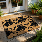 Christmas bell doormat featuring a repeating pattern of black jingle bells and holly leaves on a natural coir fiber welcome mat, perfect for holiday porch decor and festive entryway floor mats during the winter season.