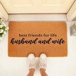 Husband and wife doormat featuring best friends for life text on a natural coir fiber welcome mat, perfect for a front porch entry way decor, wedding gift, or housewarming present for a newlywed couple at their home entrance.