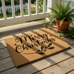 Merry Christmas coir doormat with black script lettering and a festive sprig design, this natural fiber welcome mat is a durable outdoor floor rug for holiday home decor and seasonal entryway porch decorations.
