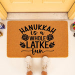 Hanukkah doormat with funny holiday quote and dreidel icons, featuring a natural coir fiber welcome mat placed on a porch, perfect for festive winter home decor and seasonal entryway floor mats for the Jewish festival of lights.