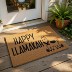 Happy Llamakah coir doormat featuring a cute llama illustration and holiday dreidels, perfect for a festive front porch welcome mat.