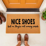 Funny Nice Shoes doormat for front porch entry, featuring a natural coir fiber welcome mat with bold black text that says Nice Shoes but no they are not coming inside, perfect for a humorous home decor entryway or housewarming.