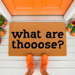 Funny What Are Thooose doormat featuring bold black text on a natural coir fiber welcome mat, perfect for a front porch entry.