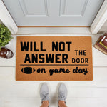 Football game day doormat with funny text that says will not answer the door on game day, featuring a football graphic on a natural coir fiber welcome mat for front porch decor, perfect for sports fans and home entrance floor