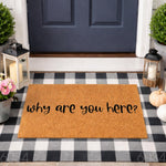 Funny Why Are You Here doormat featuring bold black text on a natural coir fiber mat, layered over a black and white buffalo plaid rug at a front door entrance for a humorous and welcoming home decor look that guests will notice.