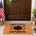 Farm Fresh Pumpkins doormat featuring a black pumpkin graphic on natural coir fiber, perfect for fall porch decor, autumn entryway mats, rustic harvest home accents, and seasonal outdoor welcome mat designs for your front door.
