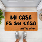 Funny Mi Casa Es Su Casa Until 9PM doormat for front porch entry, featuring bold black text on a natural coir fiber welcome mat, perfect for a humorous home decor entrance or a unique housewarming gift for friends and family.