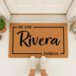 Personalized family name doormat featuring a natural coir fiber texture with black text, serving as a custom welcome mat for front porch decor that adds a stylish touch to any home entrance for housewarming or wedding