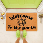 Disco ball welcome doormat for front porch entry, featuring a fun party theme with bold text and a mirror ball graphic on natural coir fiber, perfect for a festive home entrance or housewarming decor for a modern party lover.