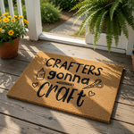 Crafters gonna craft doormat featuring a natural coir fiber welcome mat with black text and icons of glue, scissors, and a pencil, making a fun entry rug for a craft room or a creative home studio space for any hobby enthusiast.