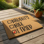 Funny Naughty Nice I Tried doormat featuring a checklist design on natural coir fiber, this humorous holiday welcome mat makes a festive front porch decoration for Christmas home decor and seasonal entryway floor matting.