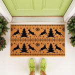 Christmas reindeer doormat with pine tree and snowflake pattern on a natural coir welcome mat, perfect for holiday porch decor, featuring a festive winter design for your front door entrance to greet guests during the season.