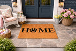 Dog paw print home doormat featuring a natural coir fiber texture, displayed on a stone porch as a pet lover welcome mat for front door entryways, perfect for dog owners looking for a durable outdoor rug with a cute animal design.