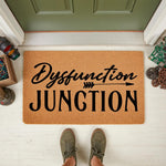 Funny Dysfunction Junction doormat for front porch entry, featuring bold black text on a natural coir fiber welcome mat.