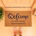 Personalized family name welcome doormat featuring a natural coir fiber texture, custom text, and a stylish script font, perfect for a front porch entryway decor update that adds a warm and inviting touch to any home entrance.