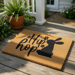 Easter bunny doormat with Hip Hop text on a natural coir welcome mat, featuring a black rabbit silhouette and floral accents for a spring porch decor look that adds a festive touch to your front door entrance and home entryway.