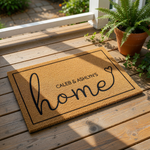 Personalized family name coir doormat featuring a script home design with a heart accent, perfect as a custom housewarming entry rug or front porch welcome mat for new homeowners looking for durable outdoor floor decor.