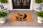 Astronaut moon doormat featuring a cute space explorer sitting on a crescent moon with a star, this natural coir welcome mat adds a fun outer space theme to your front porch decor for a unique and funny entryway floor rug.