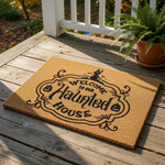 Haunted house welcome doormat featuring a spooky mansion, spider webs, and jack-o-lantern pumpkins on a natural coir fiber mat, perfect for fall porch decor and outdoor Halloween entryway floor mats for your home front door