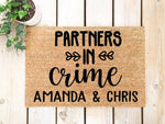 Personalized Partners in Crime doormat featuring custom couple names on natural coir fiber, this funny welcome mat makes a stylish front porch decor piece for new homeowners or a housewarming entry rug for a couple's home