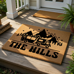 Personalized camping doormat featuring a travel trailer and mountain design on natural coir fiber, perfect for outdoor porch decor or a camper welcome mat for families who love road trips and outdoor adventure in the great