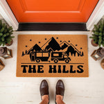 Personalized camping doormat featuring a mountain and camper van design on natural coir fiber, perfect for outdoor porch decor.