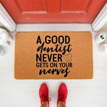 Funny Dentist Welcome Doormat featuring a cute tooth illustration and the text A Good Dentist Never Gets On Your Nerves, this natural coir fiber outdoor welcome mat is a humorous front porch decor piece for any dental office or