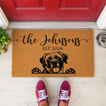 A black and white illustration of a dog's head with the text "The Johnsons EST 2020" above it.
