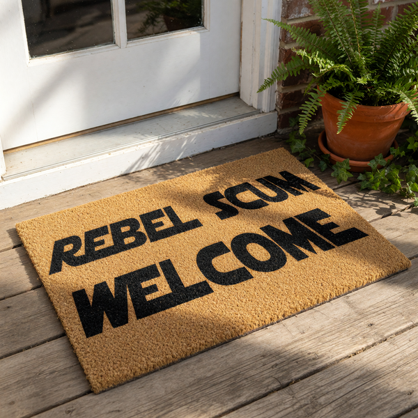 Rebel Scum Welcome doormat featuring bold black text on a natural coir fiber mat, perfect for a sci-fi fan home entrance or porch decor, this durable outdoor welcome mat adds a fun touch to any front door entryway for guests and