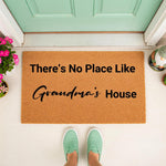 Grandma's House doormat featuring a natural coir fiber texture and black text, displayed on a front porch entryway as a decorative welcome mat for a home entrance, perfect for a cozy family house or a thoughtful grandparent gift.