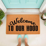 Welcome to our hood doormat featuring bold black text on a natural coir fiber mat, perfect for a front porch entryway, housewarming decor, or a funny outdoor welcome mat for your home entrance with a stylish and modern design.