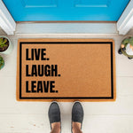 Funny Live Laugh Leave doormat for front porch entry, featuring bold black text on a natural coir fiber welcome mat.
