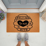 Bee hive welcome doormat with a heart design and cute bees, this natural coir fiber front door mat features a fun welcome to our hive message for a farmhouse porch decor look that adds a charming touch to any home entryway or
