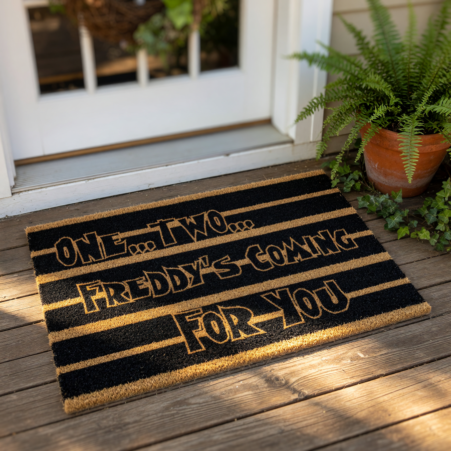 Horror movie quote doormat featuring a striped design on natural coir fiber, perfect for a spooky front porch entry.