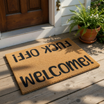 Funny welcome doormat with rude text on a natural coir fiber mat, featuring a bold black font that says Welcome and FUCK OFF on a porch floor, making this a sarcastic outdoor entrance rug for a home with a humorous and blunt