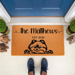 Personalized Pomeranian dog doormat for front porch, featuring a custom family name and established year on natural coir fiber.