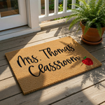 A personalized doormat with the name "Mrs.